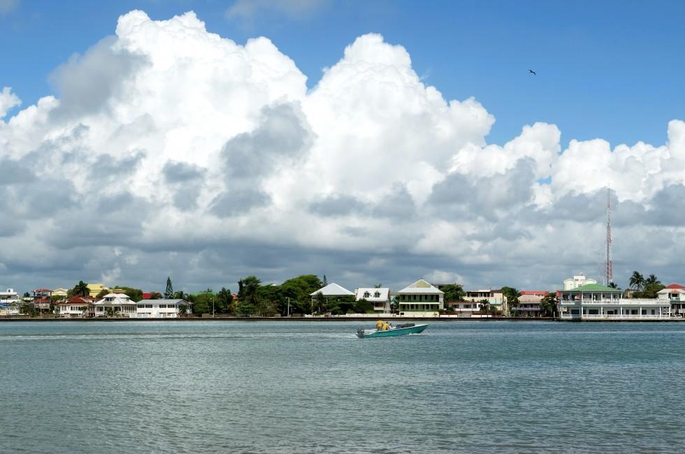 The panoramic view of boats arriving to Belize City (Belize).