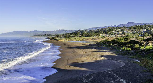 Moonstone Beach after King / High tide.Shame Park, Park Hill, & Santa Rosa Creek Estuary can be seen in the background, on California-Central-Coast, near Cambria CA 