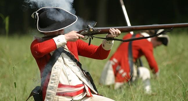 English Redcoat Soldier Firing Weapon.