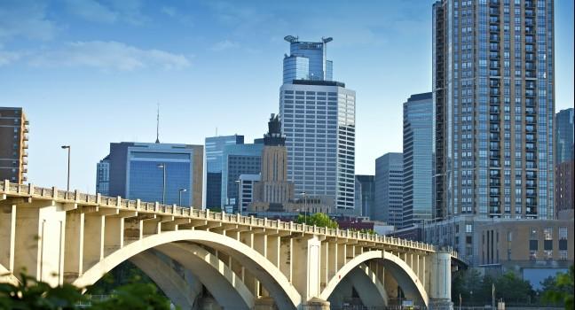 Third Avenue Bridge in Minneapolis, Minnesota. Minneapolis Skyline and Mississippi River.; 