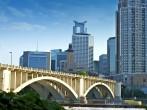 Third Avenue Bridge in Minneapolis, Minnesota. Minneapolis Skyline and Mississippi River.; 