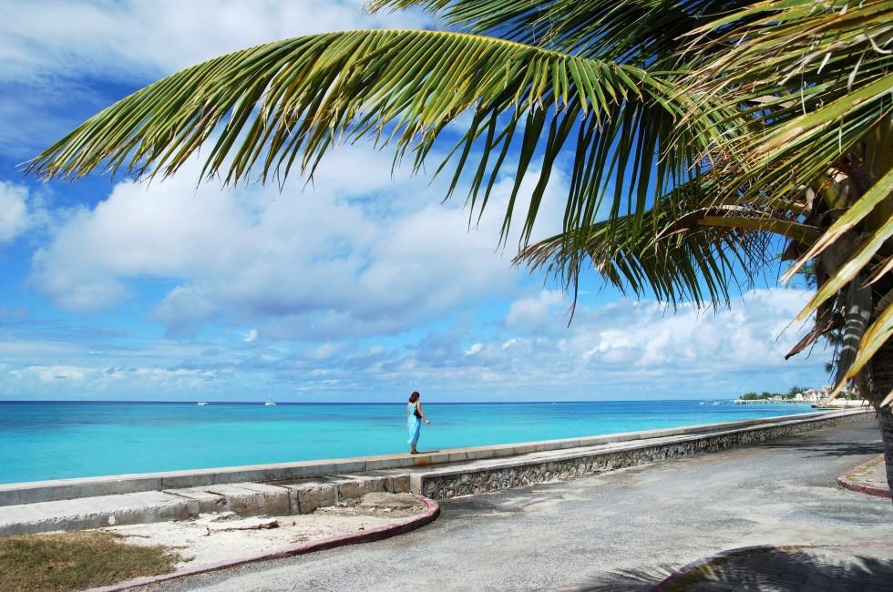 The girl walking an empty street of Cockburn Town (Grand Turk island, Turks & Caicos).
