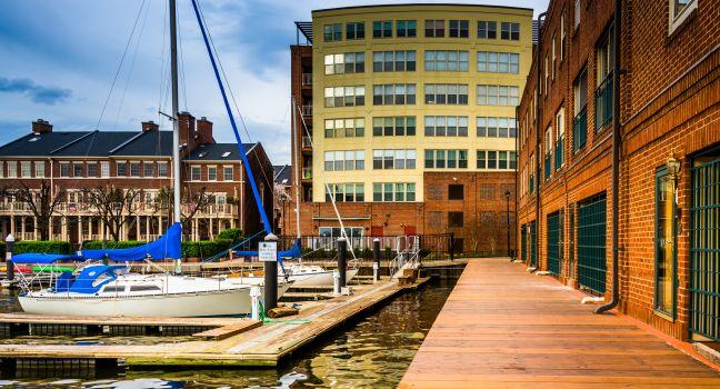 Boats and buildings on the waterfront in Fells Point, Baltimore, Maryland.