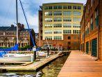 Boats and buildings on the waterfront in Fells Point, Baltimore, Maryland.