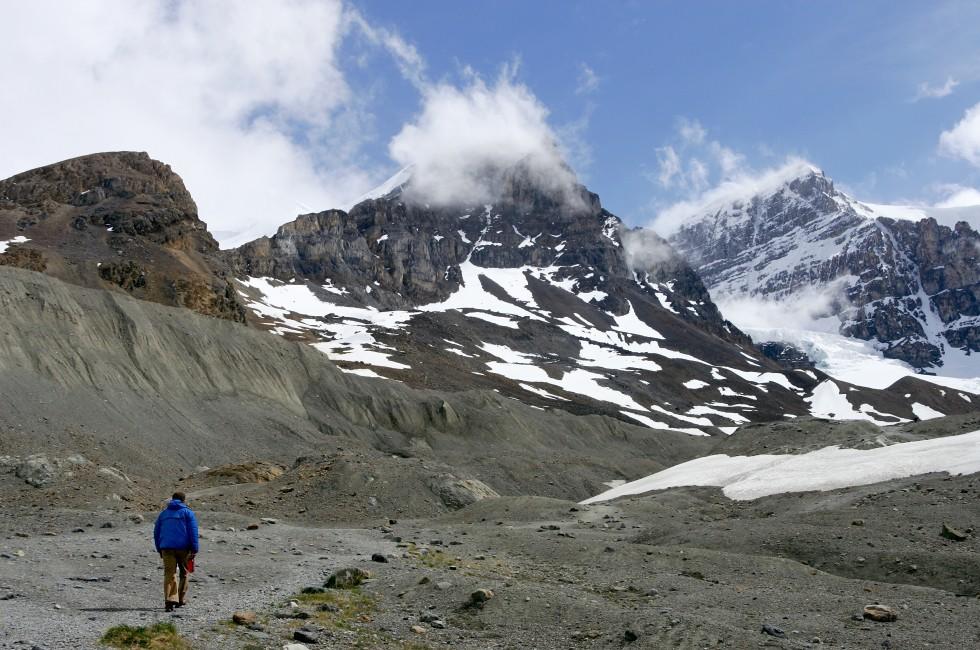 Lone hiker at Athabasca Glacier, Columbia Icefield, Jasper NP, Canada; 