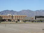TUCSON, AZ - NOVEMBER 25, 2014: The University of Arizona Medical Center against Santa Catalina mountain range and blue sky as seen from south side.