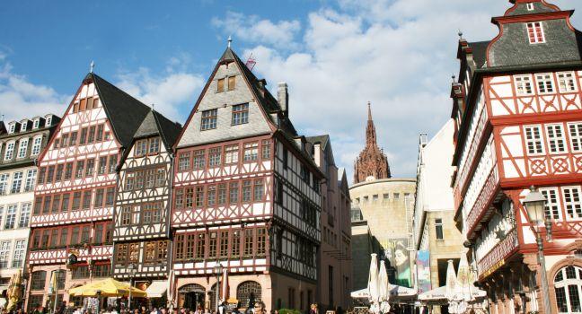 FRANKFURT AM MAIN, GERMANY, MAY The 3rd 2014: The Romer Square, one of the oldest and most historic sections of Frankfurt am Main, featuring Roman bath ruins and gabled, gothic row houses.