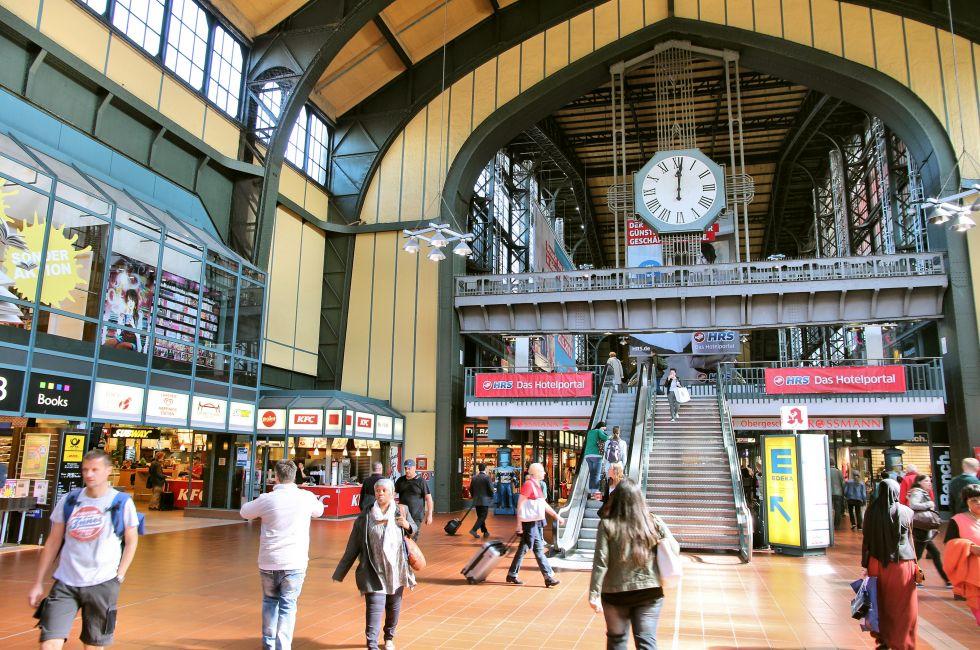 HAMBURG, GERMANY - AUGUST 28, 2014: Travelers walk inside the Central Railway Station (Hauptbahnhof) in Hamburg. With 450,000 daily passengers it is the 2nd busies station in Europe.