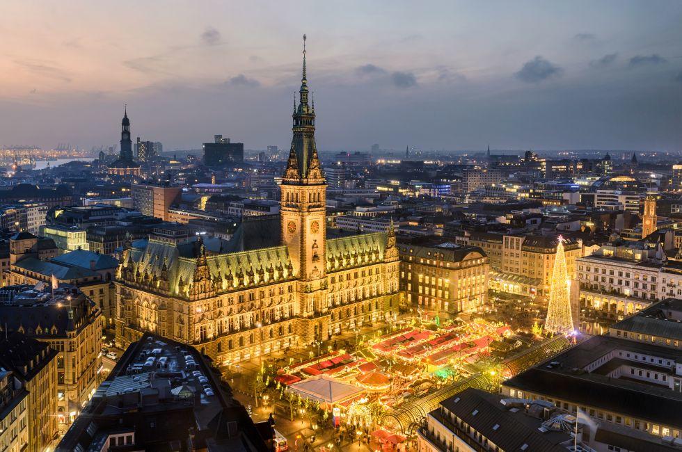 Aerial view of the City Hall with the Christmas market in Hamburg, Germany.