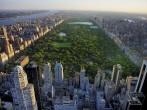 Central Park aerial view, Manhattan, New York; Park is surrounded by skyscraper.