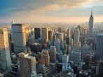 New York City Manhattan skyline aerial view with Empire State and skyscrapers at sunset.
