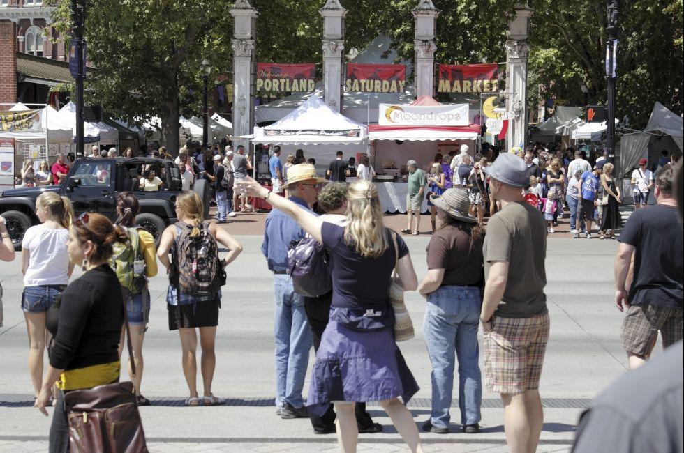 PORTLAND, OREGON - JULY 28: Many people waiting to cross SW Naito Parkway near the waterfront at the very popular Portland Saturday Market on a sunny summer day on July 28, 2012 in Portland, Oregon.; Shutterstock ID 132418202; Project/Title: Pacific NW ebo