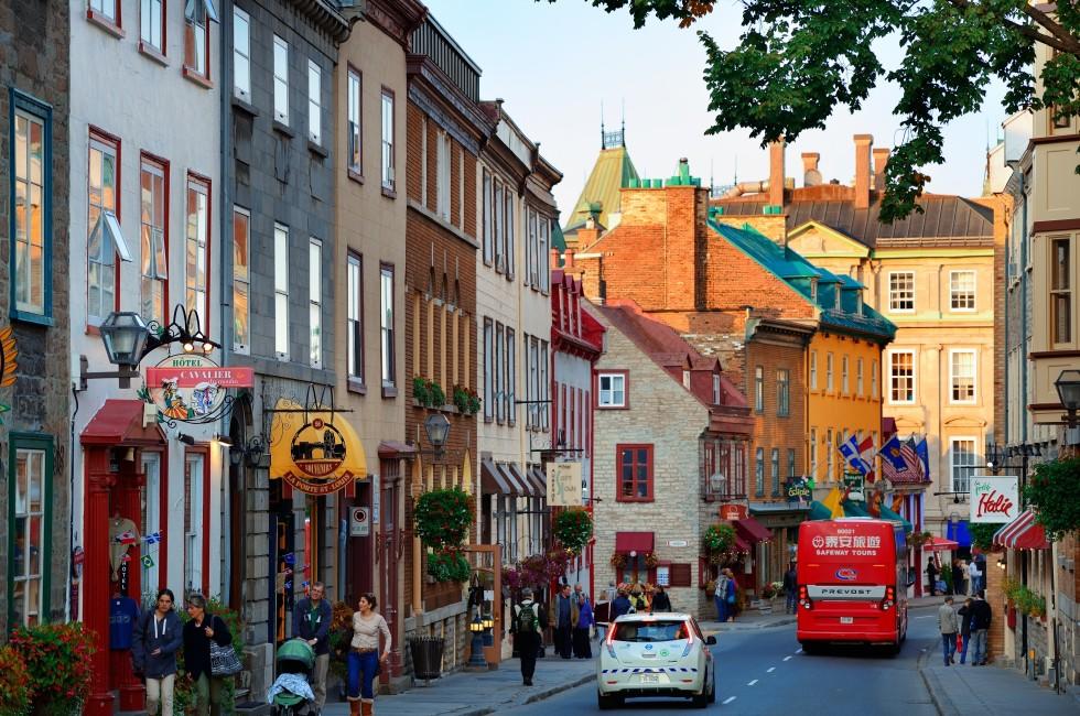  Old street with traffic on September 10, 2012 in Quebec City, Canada. As the capital of the Canadian province of Quebec, it is one of the oldest cities in North America.