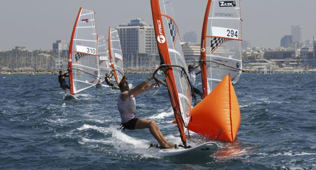 TEL-AVIV, ISRAEL-APRIL 4: Participants compete in the  Israel Youth Championship of Yacht & Windsurfing 2012 on April 2-4, 2012 in Tel-Aviv, Israel
