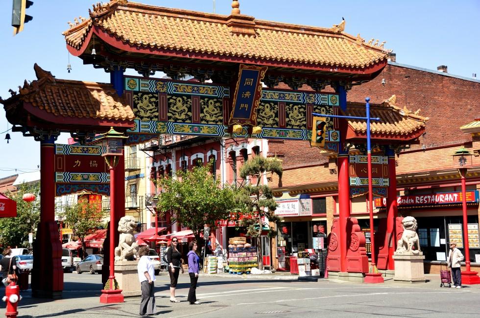 Chinatown,Victoria,B.C.,Circa,May,2014.The gates of Harmonious Interest guard Canada's oldest chinatown.Many fine restaurants,shops  the famous fantan alley,Canada's smallest alley.Come enjoy return
