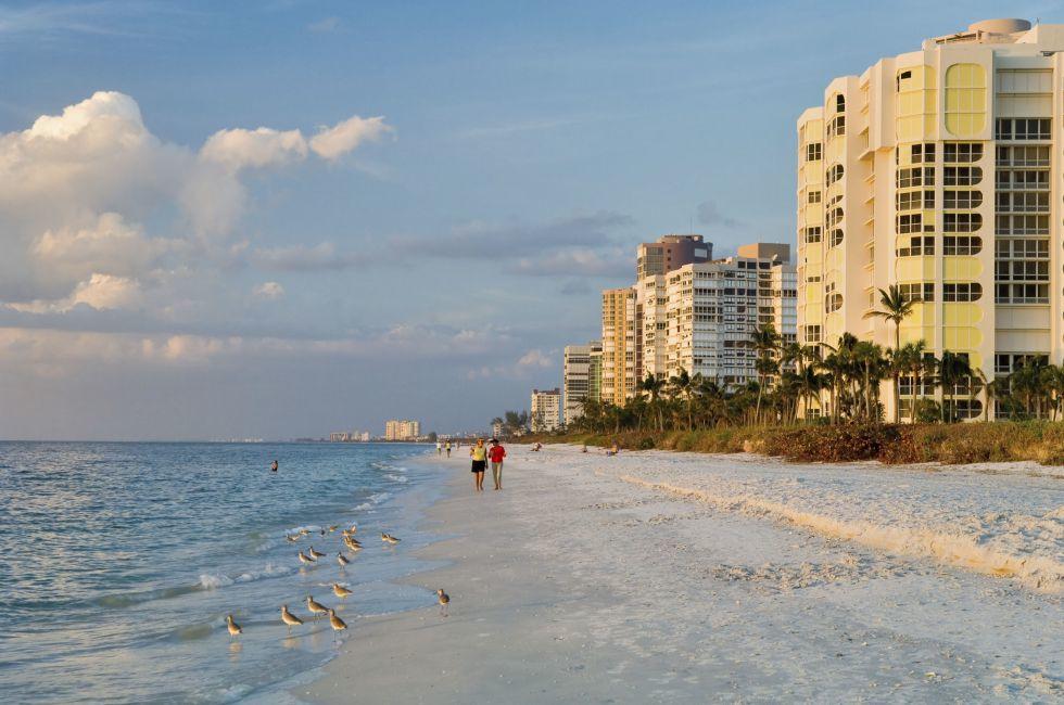florida gulf coast beach at naples in late afternoon; 