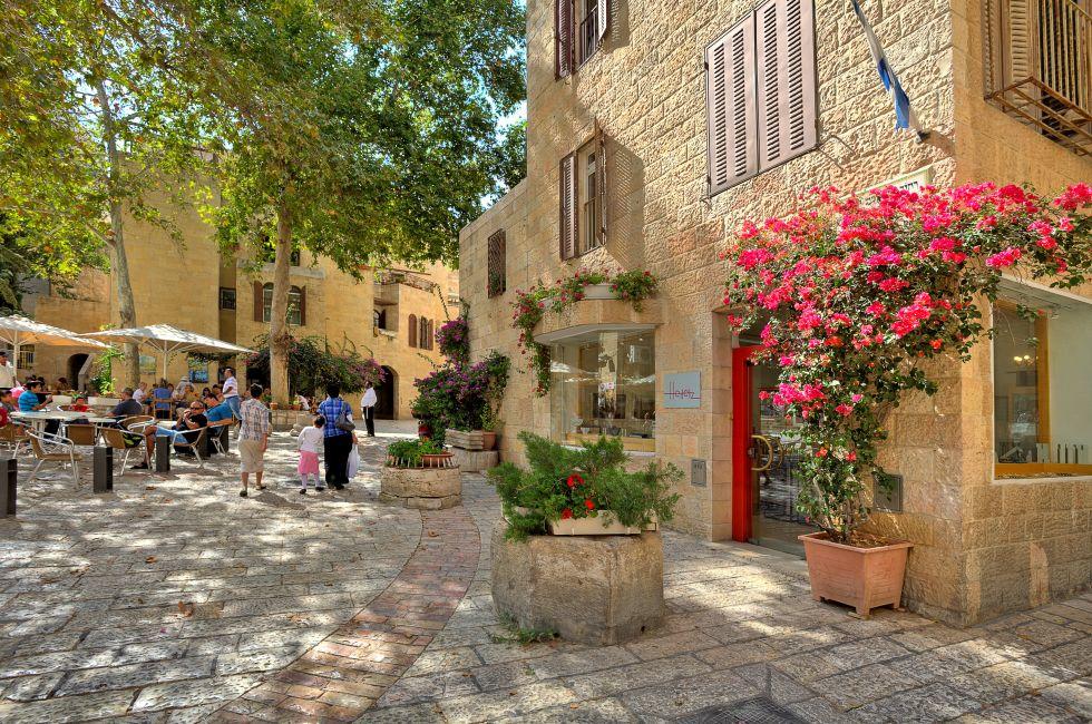 JERUSALEM - AUGUST 21: Narrow cobbled streets of Jewish Quarter with bars, restaurants and shops - popular travel destination for tourists visiting Old City in Jerusalem, Israel on August 21, 2013.; Shutterstock ID 155541329; Project/Title: Top 100 Jerusal
