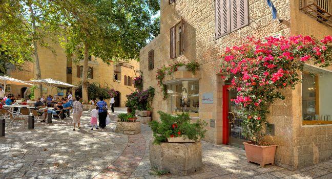 JERUSALEM - AUGUST 21: Narrow cobbled streets of Jewish Quarter with bars, restaurants and shops - popular travel destination for tourists visiting Old City in Jerusalem, Israel on August 21, 2013.; Shutterstock ID 155541329; Project/Title: Top 100 Jerusal