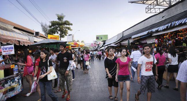 BANGKOK - NOVEMBER 26: Tourist shopping in Chatuchak weekend market on November 26, 2011 in Bangkok, Thailand. Open 8am - 6pm (Sat & Sun), It is the largest market in Thailand.;