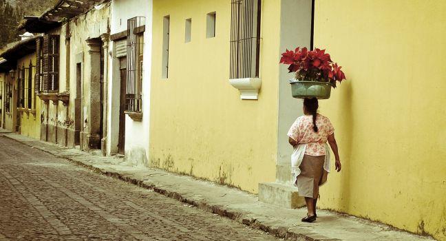 Woman, cobble streets Antigua Guatemala. 