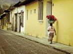 Woman, cobble streets Antigua Guatemala. 