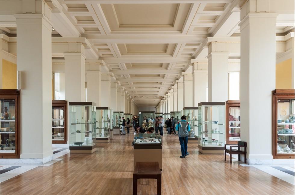 LONDON, UK - CIRCA JULY 2012: People visiting the British Museum Asian department.