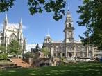 The Octagon, center of Dunedin, New Zealand, with St. Paul's Cathedral to the left and Municipal Chambers more to the right; 