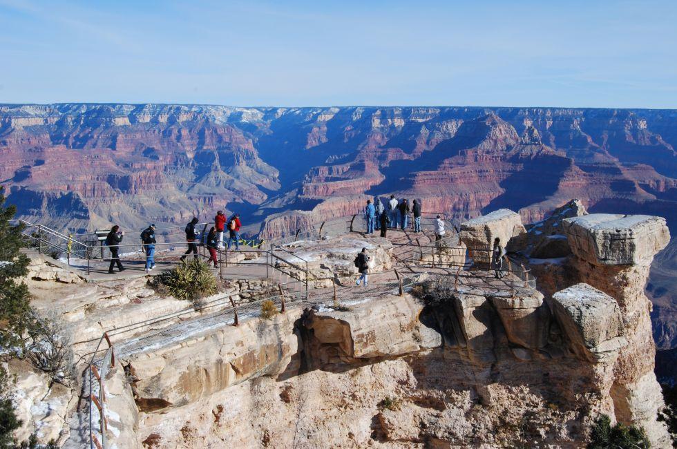 Tourists at the Grand Canyon taken from Grandview Point overlook South rim.