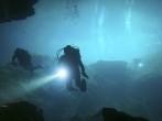 Divers in cenote.