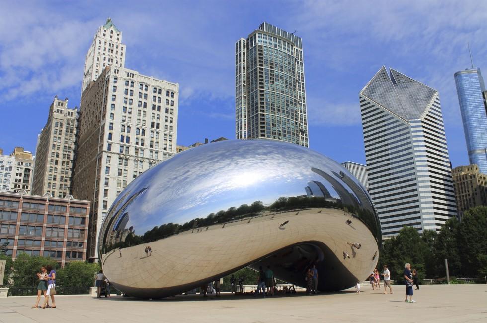 CHICAGO - JUNE 18: Chicago Cloud Gate sculpture in Millennium Park on June 18, 2012 in Chicago, Illinois. Known as the Bean and made of steel, it was created by Anish Kapoor and unveiled in 2004.