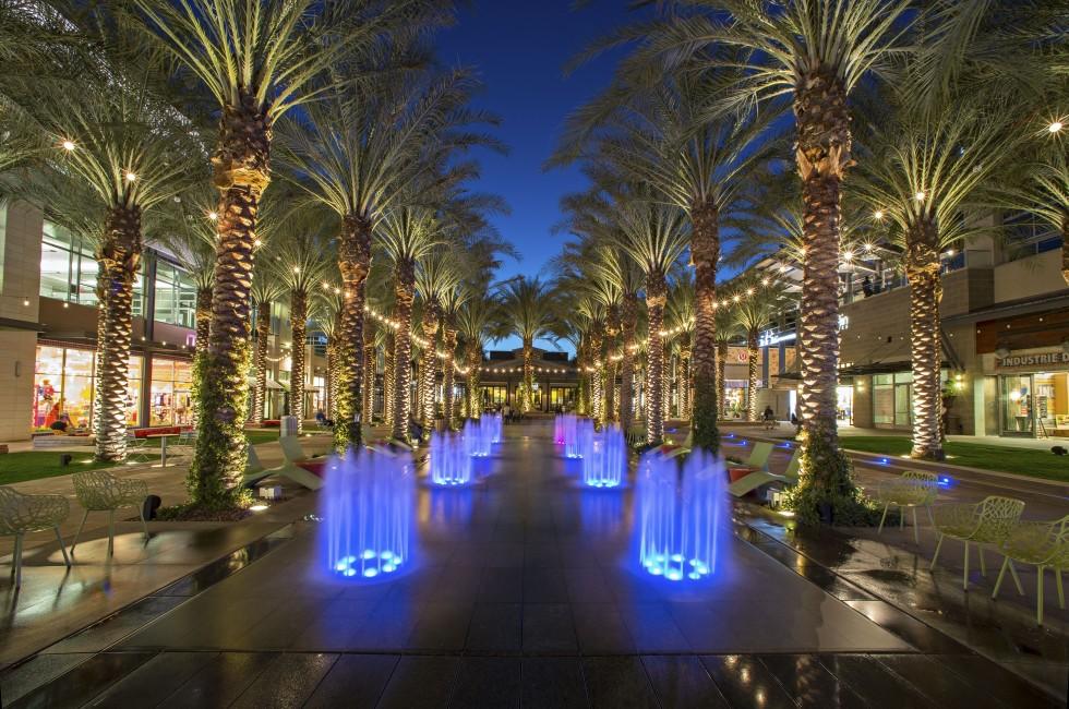 SCOTTSDALE, ARIZONA - MARCH 12: Splash pad lit up at night at the Scottsdale Quarter shopping center in Scottsdale, Arizona on March 12, 2013.  North Scottsdale is a desirable tourist destination.; Shutterstock ID 168839804; Project/Title: AARP; Downloader
