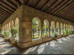 NEW YORK, USA - OCT 22, 2015: Colonnade and garden at The Cloisters, the branch of The Metropolitan Museum of Art devoted to the art and architecture of medieval Europe, , New York,USA.