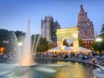 NEW YORK CITY - SEPTEMBER 12, 2012: Crowds gather at Washington Square Park. The historic park is popular in the summer.