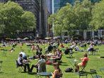 NEW YORK, USA - MAY 16: People enjoying a nice day in Bryant Park on May 16, 2013 in New York City, NY. Bryant Park is a 9,603 acre privately managed park in the center of Manhattan.