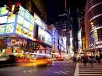 Times Square, famous tourist attraction featured with Broadway Theaters and famous restaurant and store locations in New York City, June 3, 2012 in Manhattan, New York City.