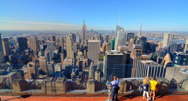 NEW YORK CITY - AUGUST 30: Observers view Midtown from Top of the Rock August 30, 2011 in New York, NY. The GE Building observation deck is one of only two open to the public in Manhattan.; Shutterstock ID 84067600; Project/Title: Fodor's New York City 201
