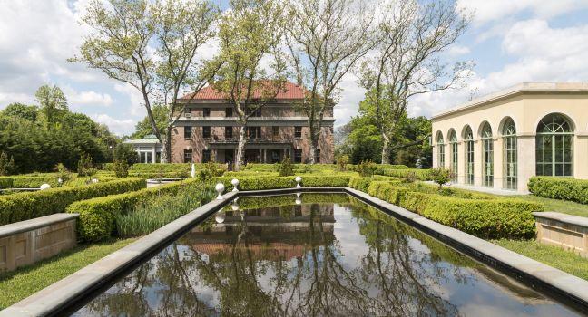 Snug Harbor was established in the 19th century as a hospice for sailors. It is now a public park.