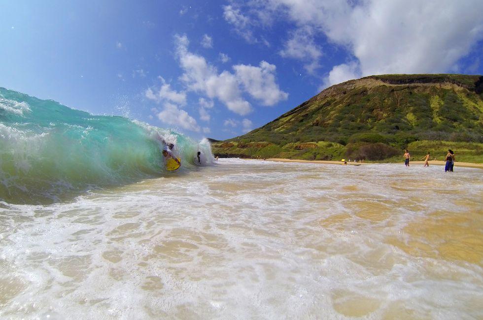 Body boarding waves at Sandy Beach Hawaii.