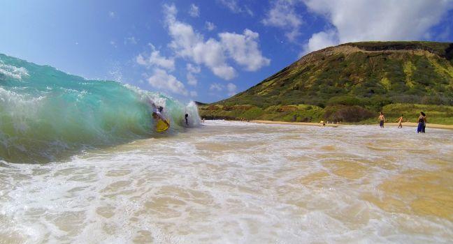 Body boarding waves at Sandy Beach Hawaii.
