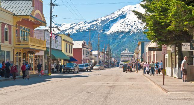 SKAGWAY, AK - JUNE 2: Main shopping district in the small town of Skagway on June 2, 2009.  During the summer months, Skagway receives more than 800,000 visitors from cruise ships