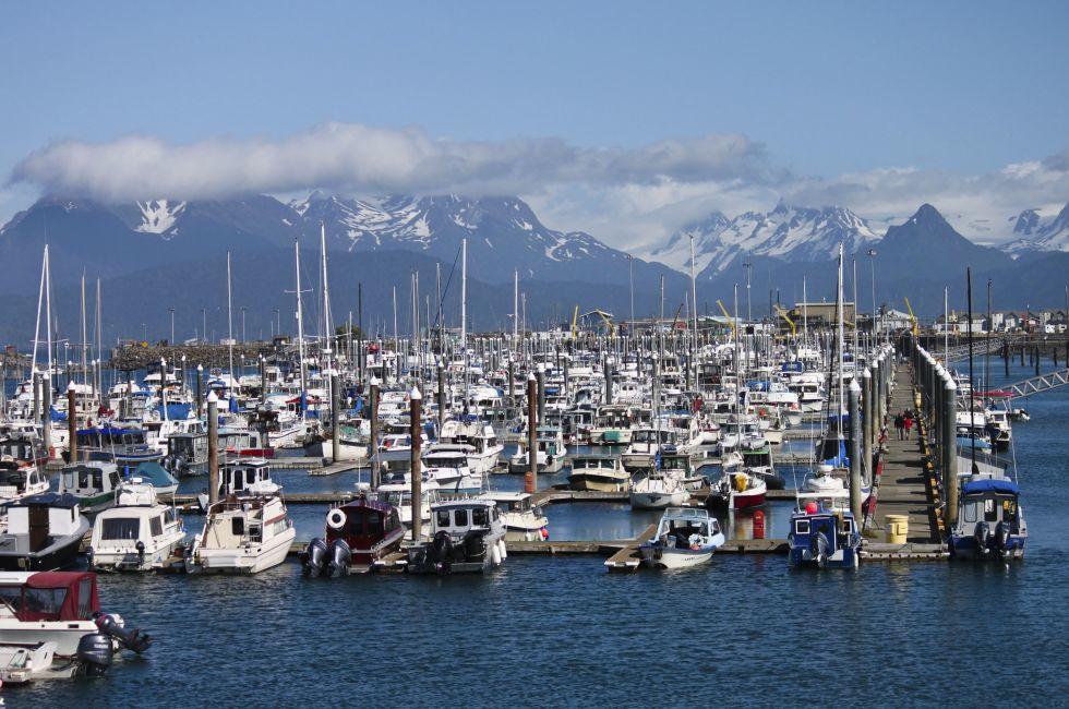 Walking on docks through marina in Homer Alaska.