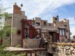 PHOENIX,ARIZONA,USA-NOVEMBER 30: Tourists visit the Mystery Castle in Phoenix on November 30, 2013. The castle was built in the 1930s and 40s by Boyce Gully for his daughter.; 