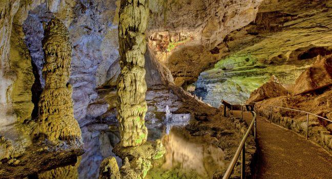 Subterranean columns in spring-fed pool, Carlsbad Caverns National Park, New Mexico.