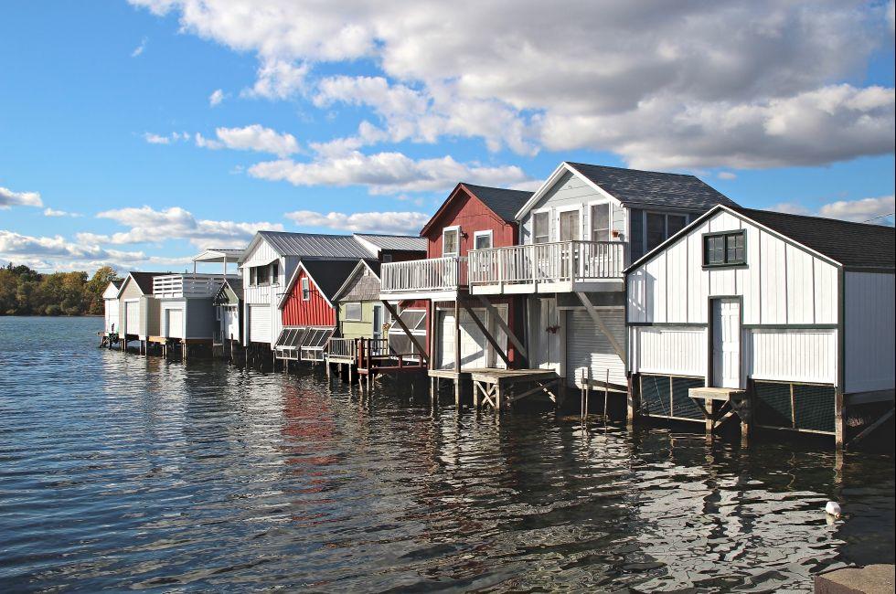 A row of boat houses on Canandaigua Lake in the Finger Lakes region of New York. Boathouses on Canandaigua Lake, New York