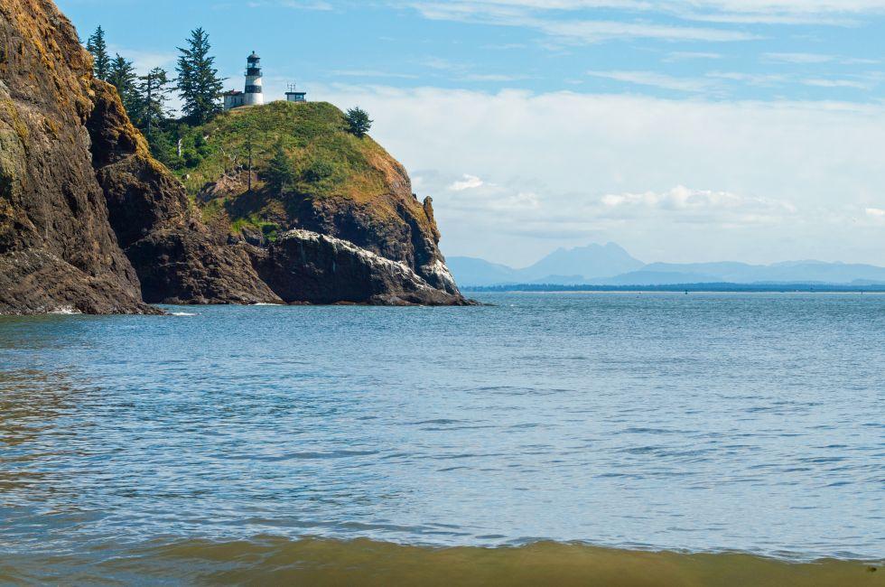 Cape Disappointment Lighthouse in Fort Canby State Park from Waikiki Beach near Ilwaco Washington USA