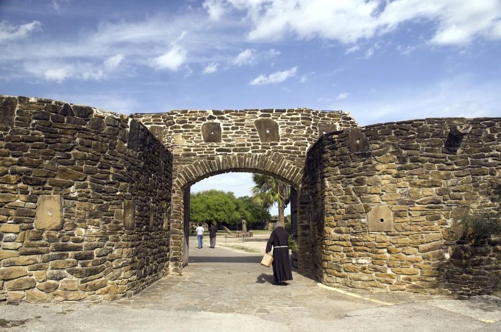 Sunday morning walk into the entrance of San Jose Mission.; 