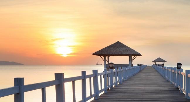 Boat pier at sunset. Beautiful landscape.