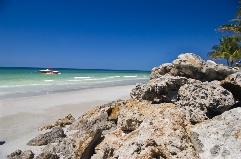 Boulders placed on beach to prevent erosion.