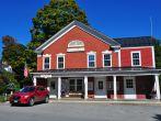 Grafton, Vermont:  A long portico covers the entrances to the 1816 brick Town Hall and United States Post Office 