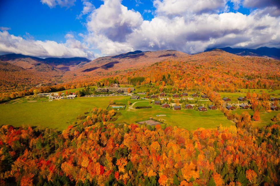 Aerial view of fall foliage including Trapp Family Lodge, Stowe, Vermont, USA